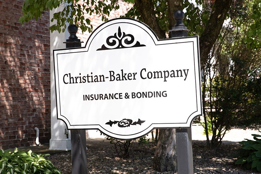 Lemoyne, PA Insurance - Closeup of Christian-Baker Insurance & Bonding Sign Under a Tree